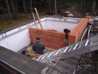Installing interior dividing wall in basement from clay bricks