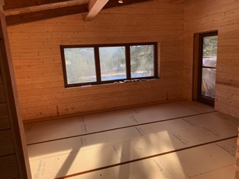 Walls sanded, wood-fibre floor insulation installed