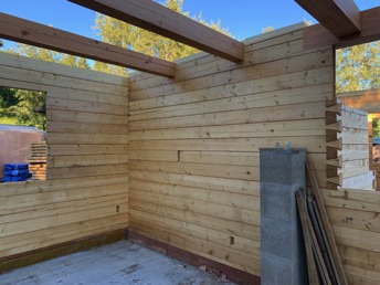 Living room with first pieces of masonry chimney