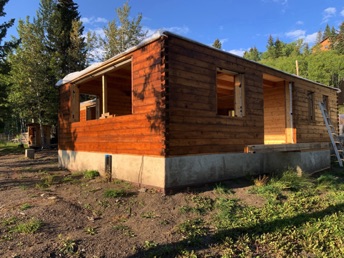 Exterior logs stained with Sansin Envirostain