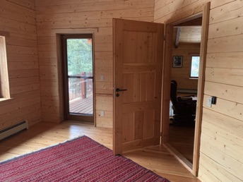 Bedroom with custom-made Douglas Fir door